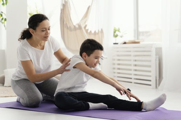 full-shot-woman-boy-yoga-mat full-shot-woman-boy-yoga-mat