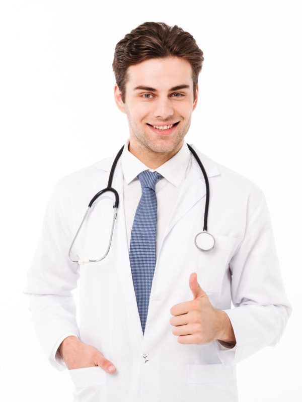Portrait of a smiling handsome male doctor Portrait of a smiling handsome male doctor dressed in uniform with stethoscope showing thumbs up gesture isolated over white background
