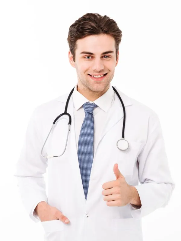 Portrait of a smiling handsome male doctor Portrait of a smiling handsome male doctor dressed in uniform with stethoscope showing thumbs up gesture isolated over white background